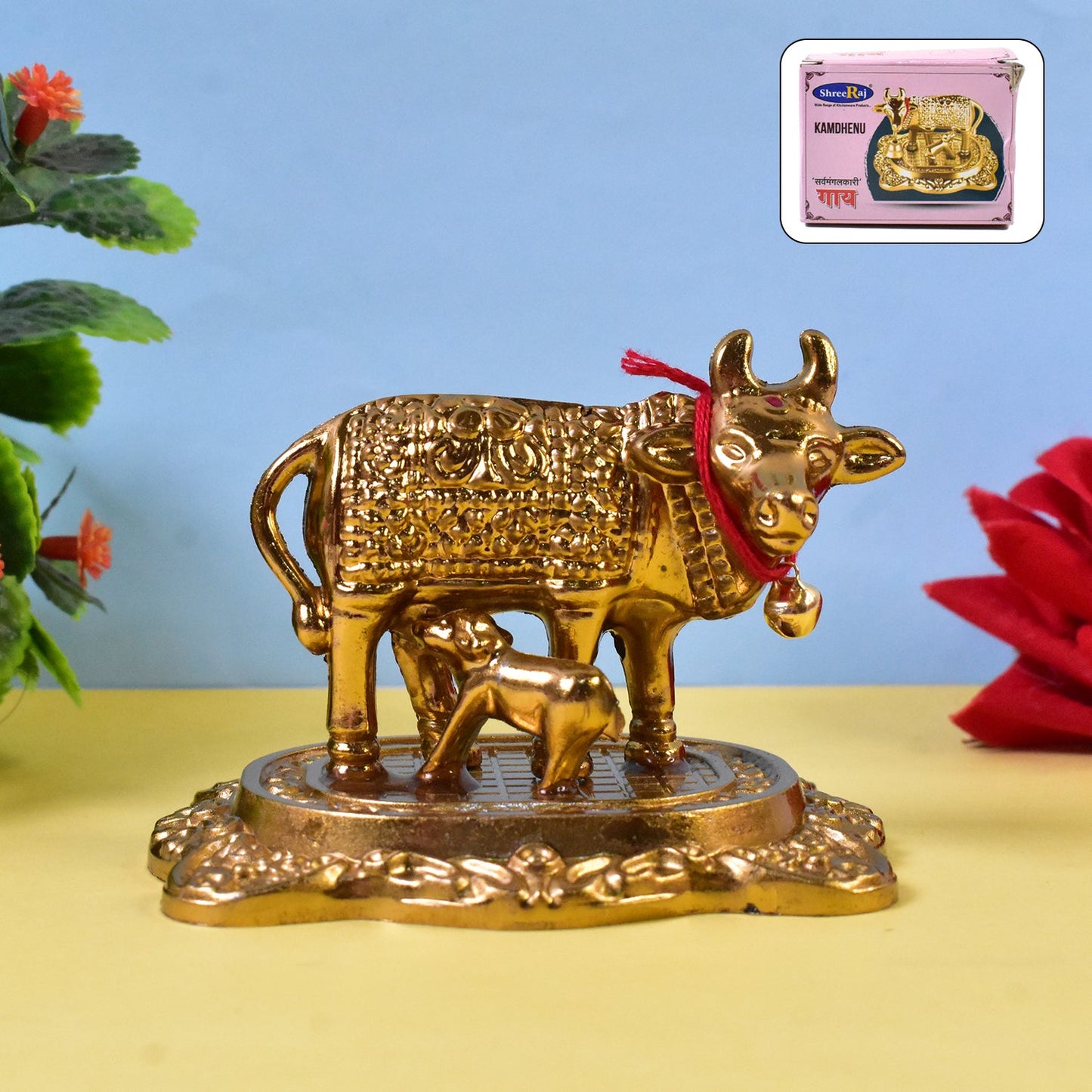 golden metal Kamdhenu cow with calf idol for home decor, handcrafted Kamadhenu cow and calf statue, decorative Kamdhenu idol for pooja room, spiritual cow and calf figurine for vastu and peace, gold finish Kamdhenu cow idol with intricate detailing,