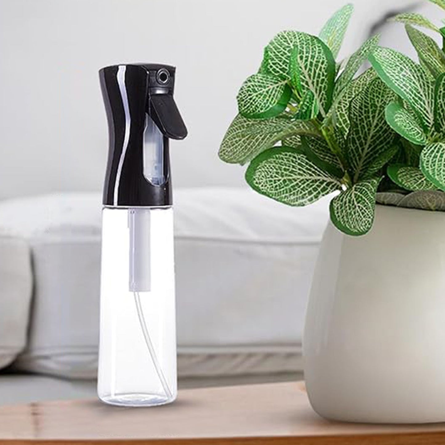 refillable fine mist spray bottle for hair and skincare, best plastic spray bottle for indoor plants and home cleaning, fine mist water sprayer for essential oils and disinfectants, compact travel-friendly spray container for multipurpose use,