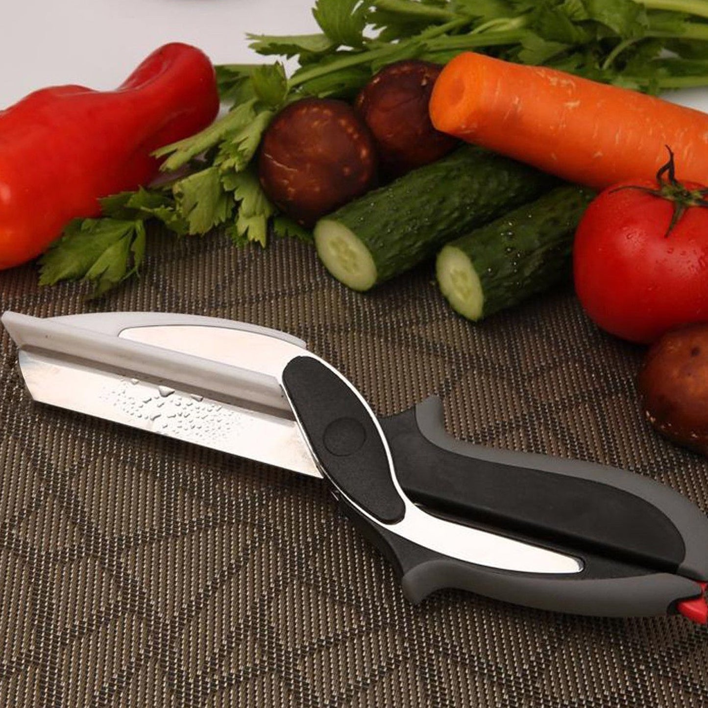 2-in-1 food chopper with handle for versatile cutting and dicing. clever cutter, 2 in 1 food chopper, kitchen cutter tool, smart vegetable slicer, multi-purpose food chopper, fruit cutting knife, portable kitchen chopper