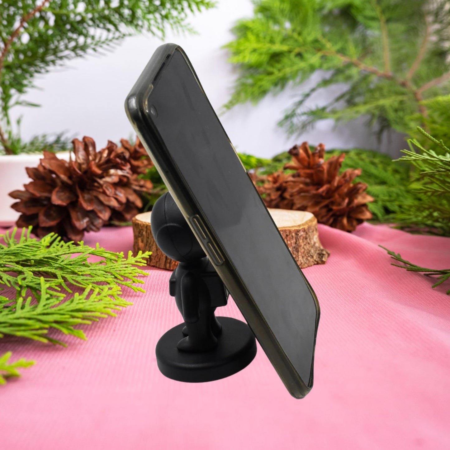 universal magnetic car mount with 360 swivel, creative astronaut car phone accessory, compact phone holder with space-themed design