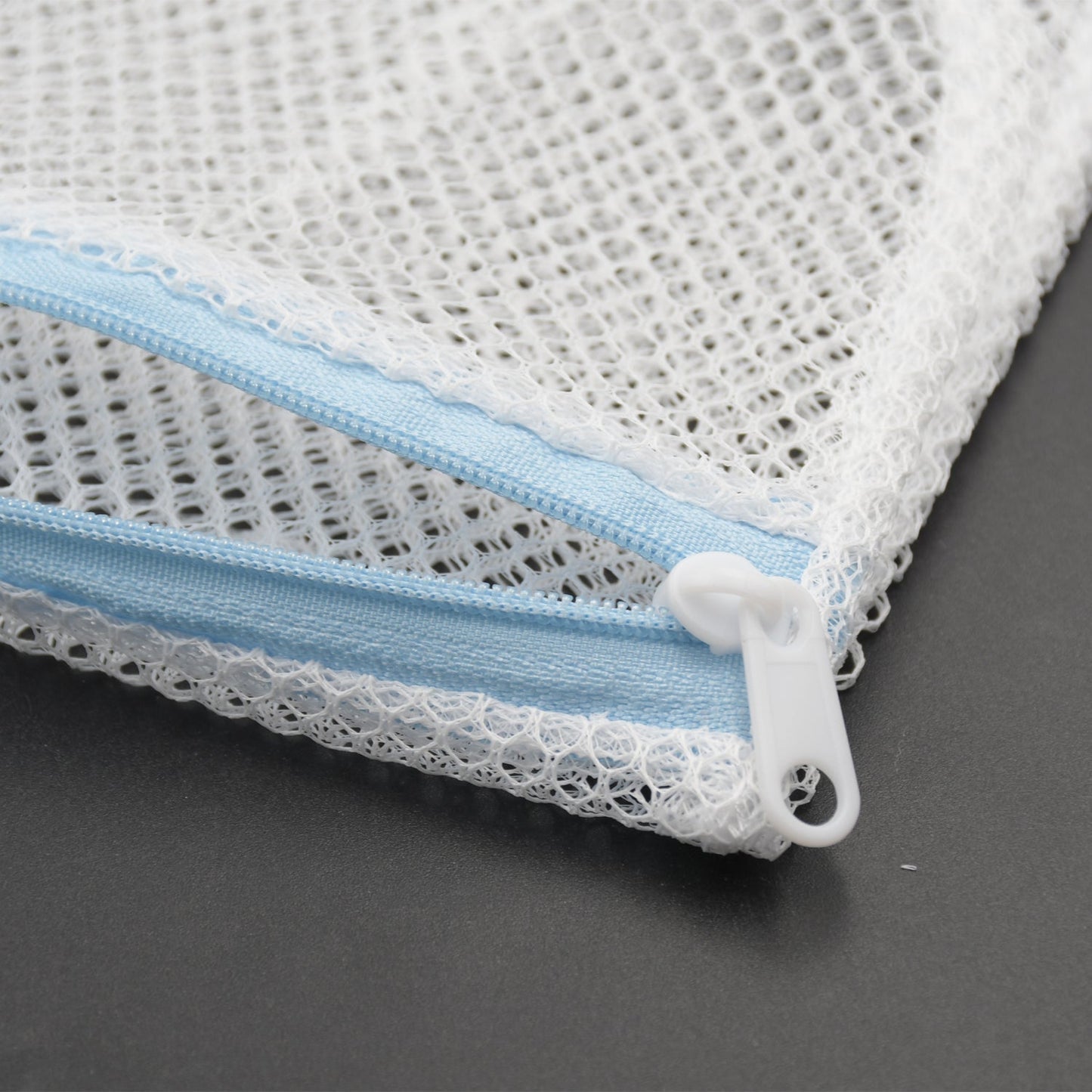 High-quality mesh laundry bag with zipper for safe washing of delicate items. mesh laundry bag, laundry bag for delicates, bra washing bag, underwear laundry pouch, lingerie wash bag, travel organizer bag, zipper mesh laundry bag