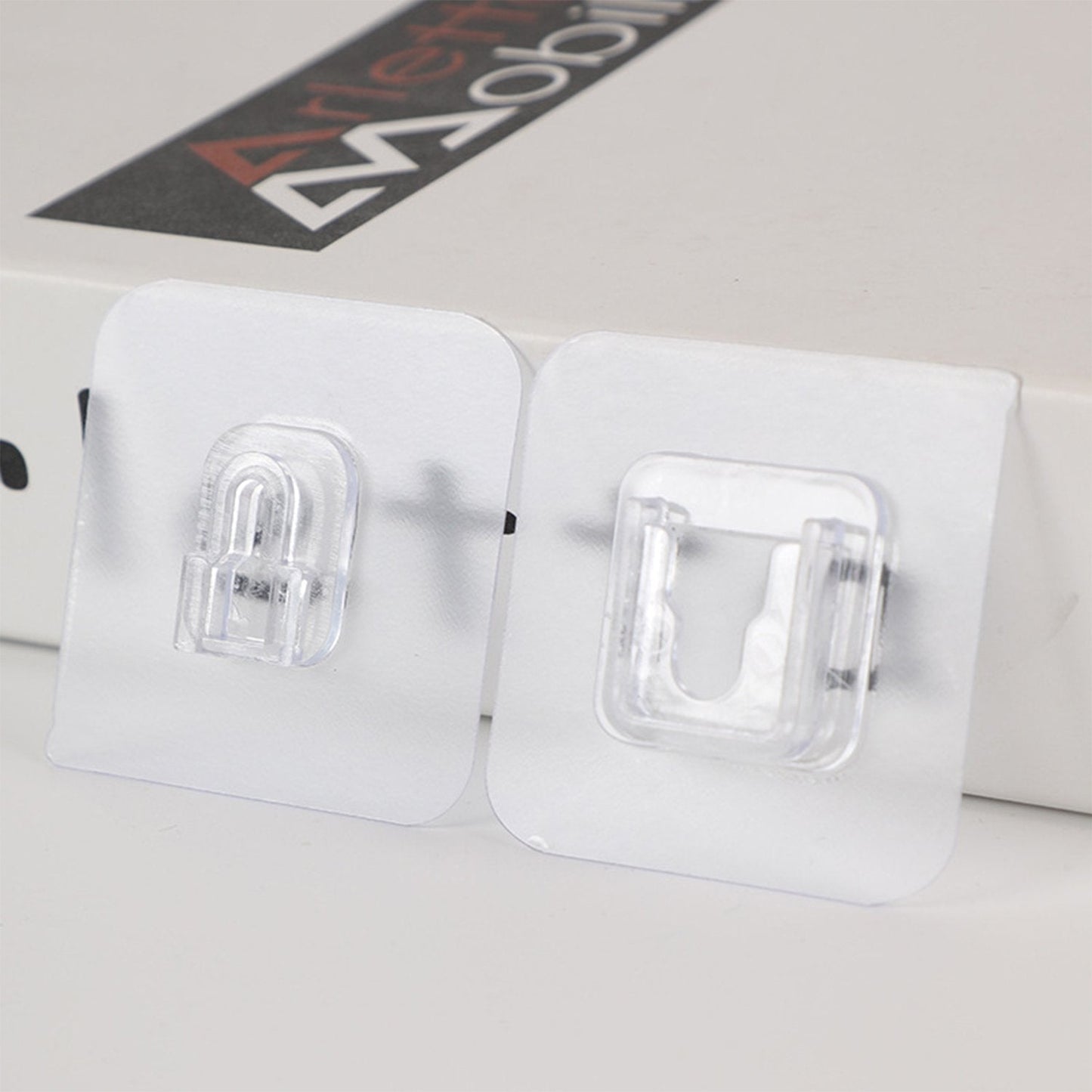 Pack of 20 heavy duty adhesive hooks, for reliable wall mounting. adhesive wall hooks, self adhesive hooks, heavy duty hooks, plastic wall hooks, reusable wall hooks, no drill hooks, transparent wall hooks, waterproof hooks