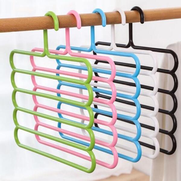 Multipurpose plastic hanger with five layers for clothing. multipurpose plastic hanger, 5 in 1 hanger, clothes organizer, closet space saver, non-slip plastic hanger, trouser hanger, scarf belt tie organizer, wardrobe hanger set