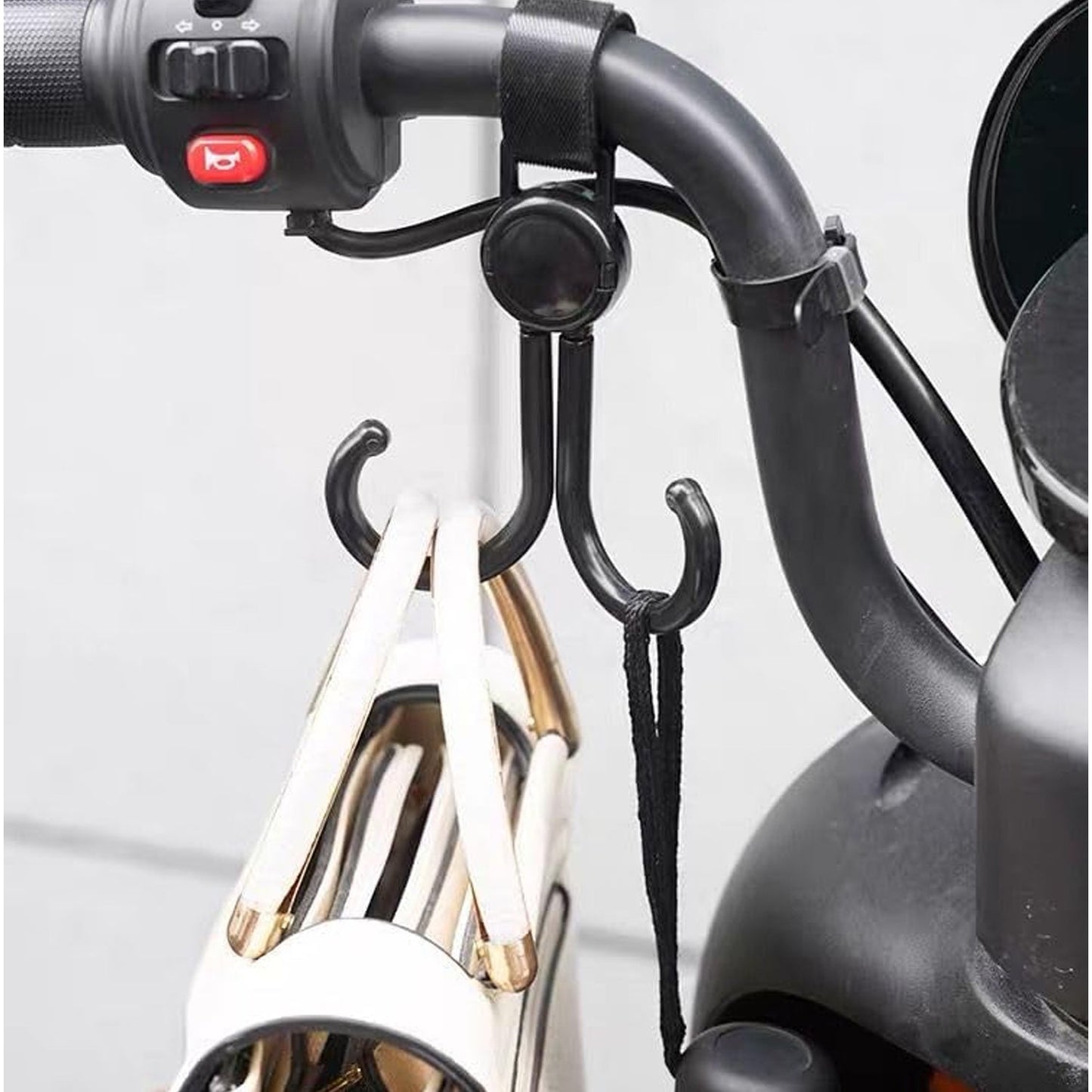 Pushchair hook accessory carrying purse while walking outdoors