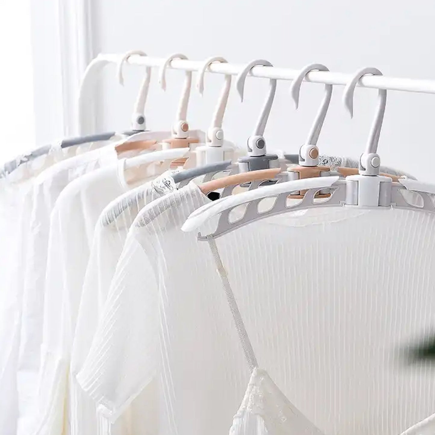 Non-slip folding clothes hanger designed for kids and adult garments to prevent slipping and deformation