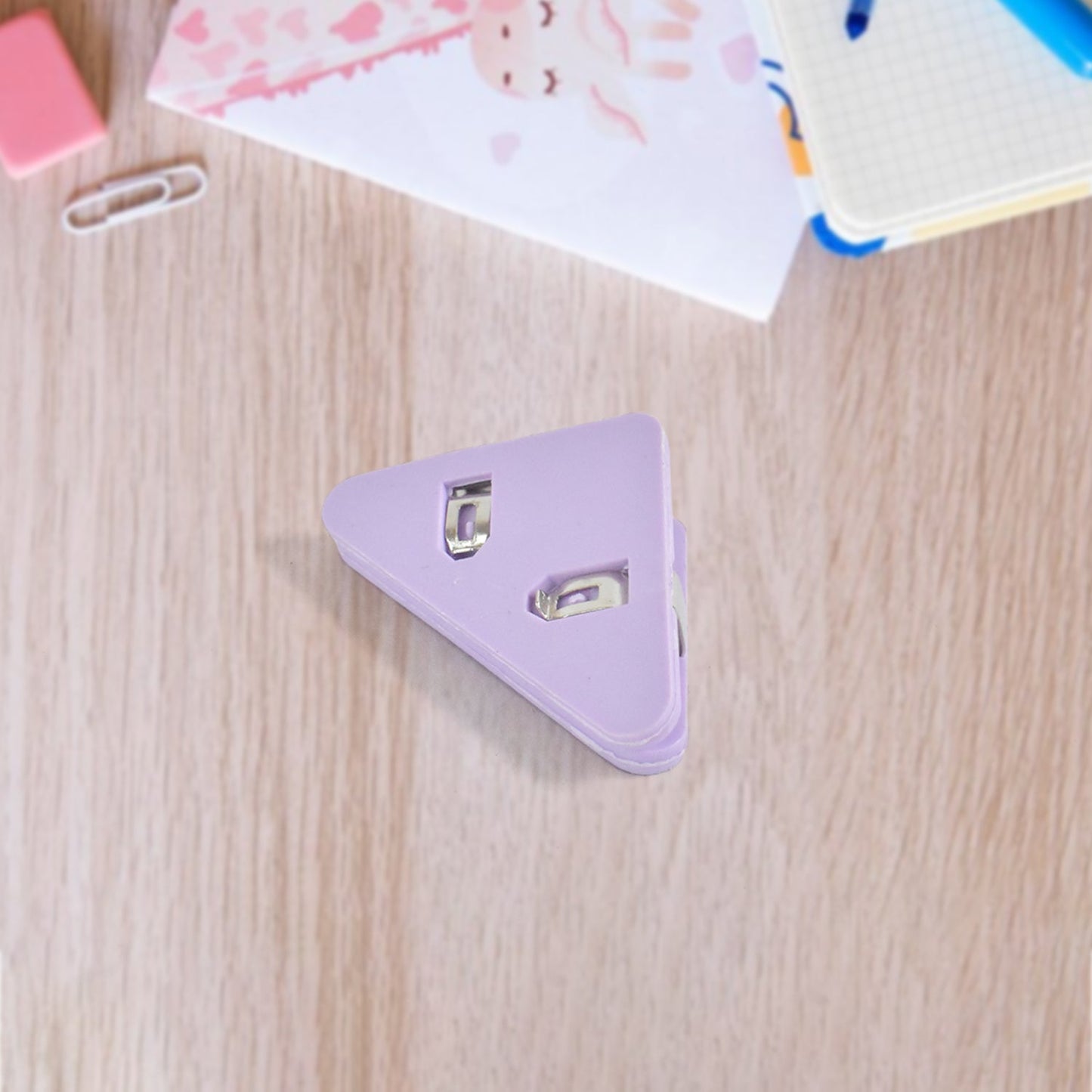 triangle shaped paper clips for documents and notes, best small corner clips for paper organization in India, premium triangle paper clips for office and school stationery, stylish triangle clips for paper holding and sorting,
