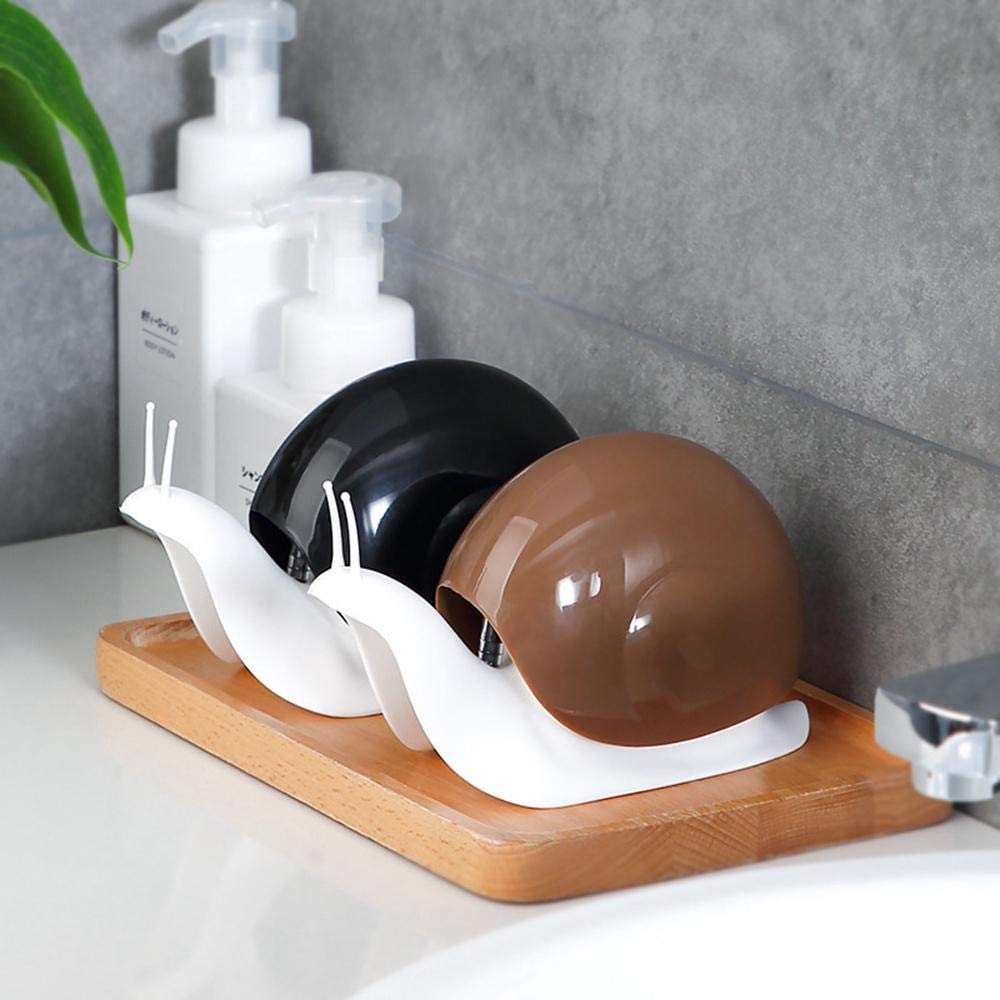 Unique snail-shaped soap dispenser for convenient liquid soap access. snail shape soap dispenser, liquid soap pump bottle, refillable soap container, glass soap dispenser, cute bathroom soap holder, kitchen hand wash bottle