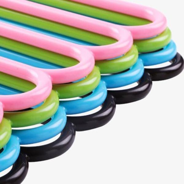 Plastic hanger with multiple layers for organizing garments. multipurpose plastic hanger, 5 in 1 hanger, clothes organizer, closet space saver, non-slip plastic hanger, trouser hanger, scarf belt tie organizer, wardrobe hanger set