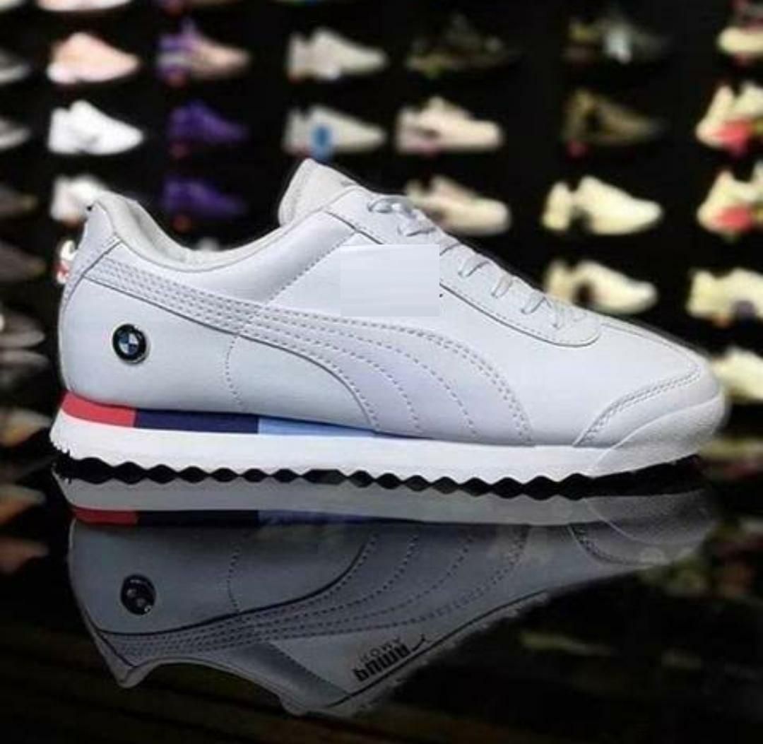 Puma white men’s casual shoes online,