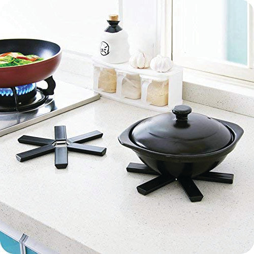 Foldable heat-resistant kitchen hot mat with non-slip design. foldable silicone hotmat, heat resistant kitchen mat, non-slip trivet pad, foldable hot dish holder, kitchen counter protector, silicone trivet for pots