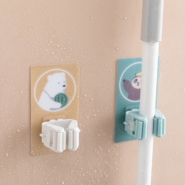 Magic sticker broom and mop holder for home storage solutions. wall mounted mop holder, broom organizer, self adhesive holder, kitchen mop rack, reusable wall hanger, anti-slip mop hook, storage rack for tools, mop clip holder