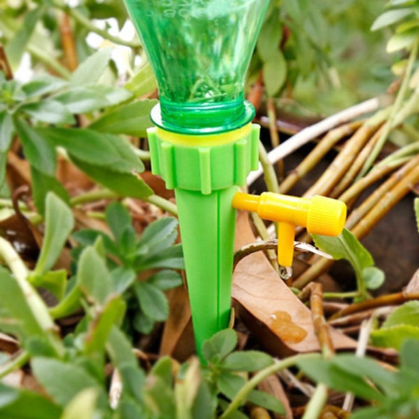 Self-watering spikes for garden use, self watering spikes, drip irrigation spikes, automatic watering for plants, adjustable valve plant waterer, gardening spikes, plant watering system, indoor outdoor plant drip, bottle irrigation spikes, garden drip spike, plant hydration tool