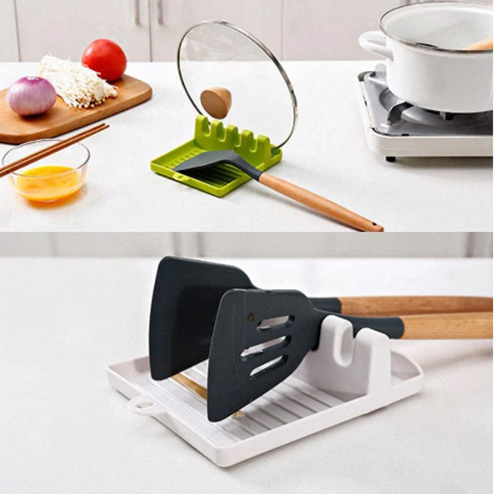 Versatile kitchen spatula holder with functional design. silicone spoon rest, utensil holder tray, 4 slot spatula stand, kitchen spoon rack, heat resistant silicone mat, spatula holder tray, cooking spoon rest, multicolor utensil holder, countertop spoon rest