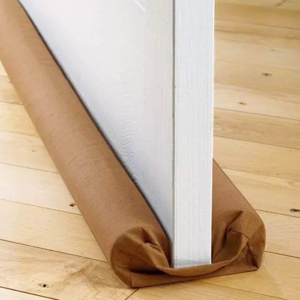 Draft stopper installed at the base of a door. under door draft guard, twin draft stopper, door dust blocker, washable door seal, fabric draft guard, door noise stopper, under door insulation