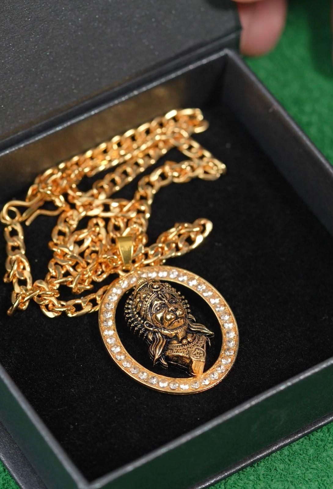 hanuman diamond alloy locket set, spiritual hanuman jewelry gold plated, men’s hanuman face pendant with diamonds, gold alloy hanuman pendant locket, hanuman diamond pendant necklace set, devotional hanuman pendant for men, gold plated hanuman locket with chain, spiritual hanuman jewelry set for men, hanuman face pendant gold finish