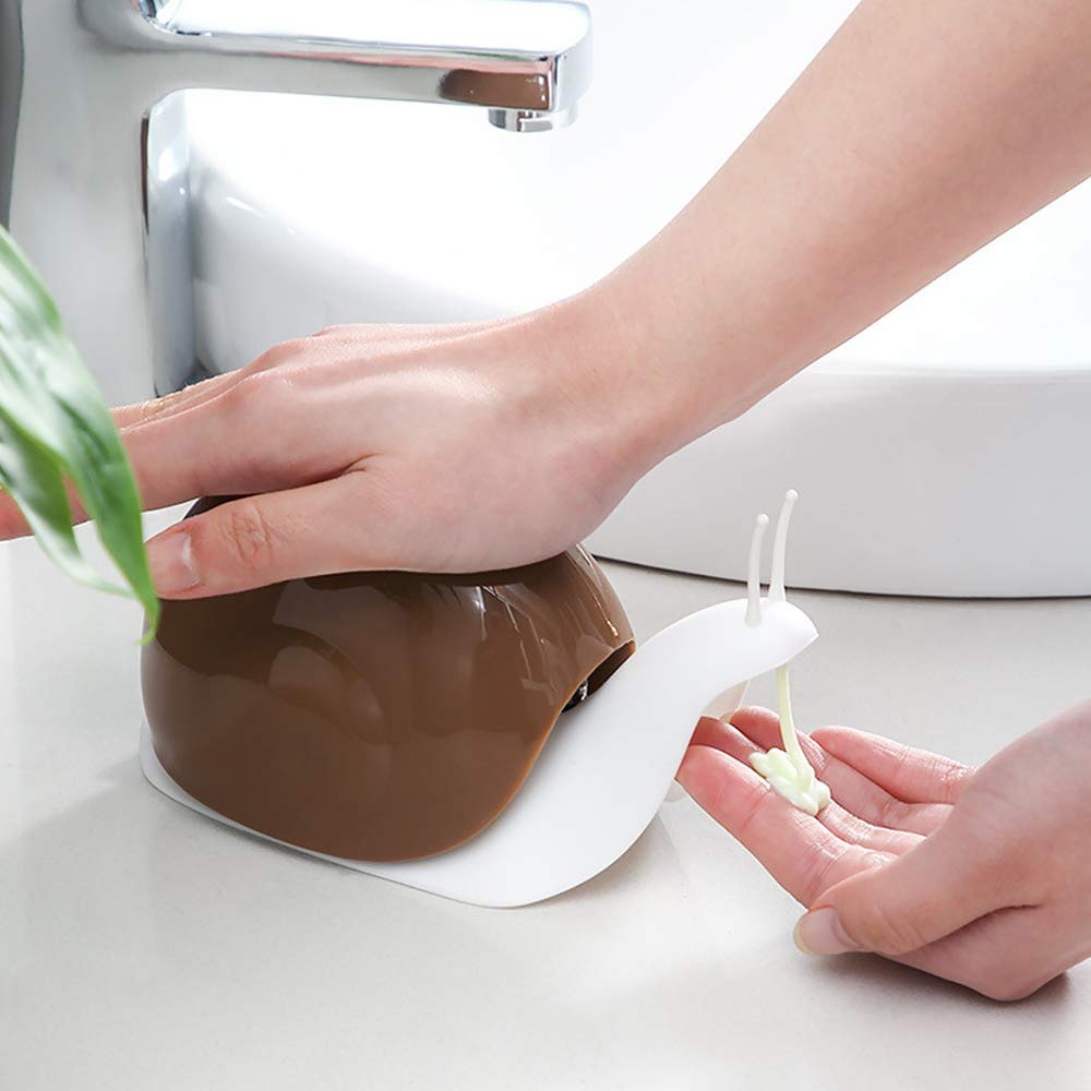 Portable soap dispenser in snail shape for easy handling and use. snail shape soap dispenser, liquid soap pump bottle, refillable soap container, glass soap dispenser, cute bathroom soap holder, kitchen hand wash bottle