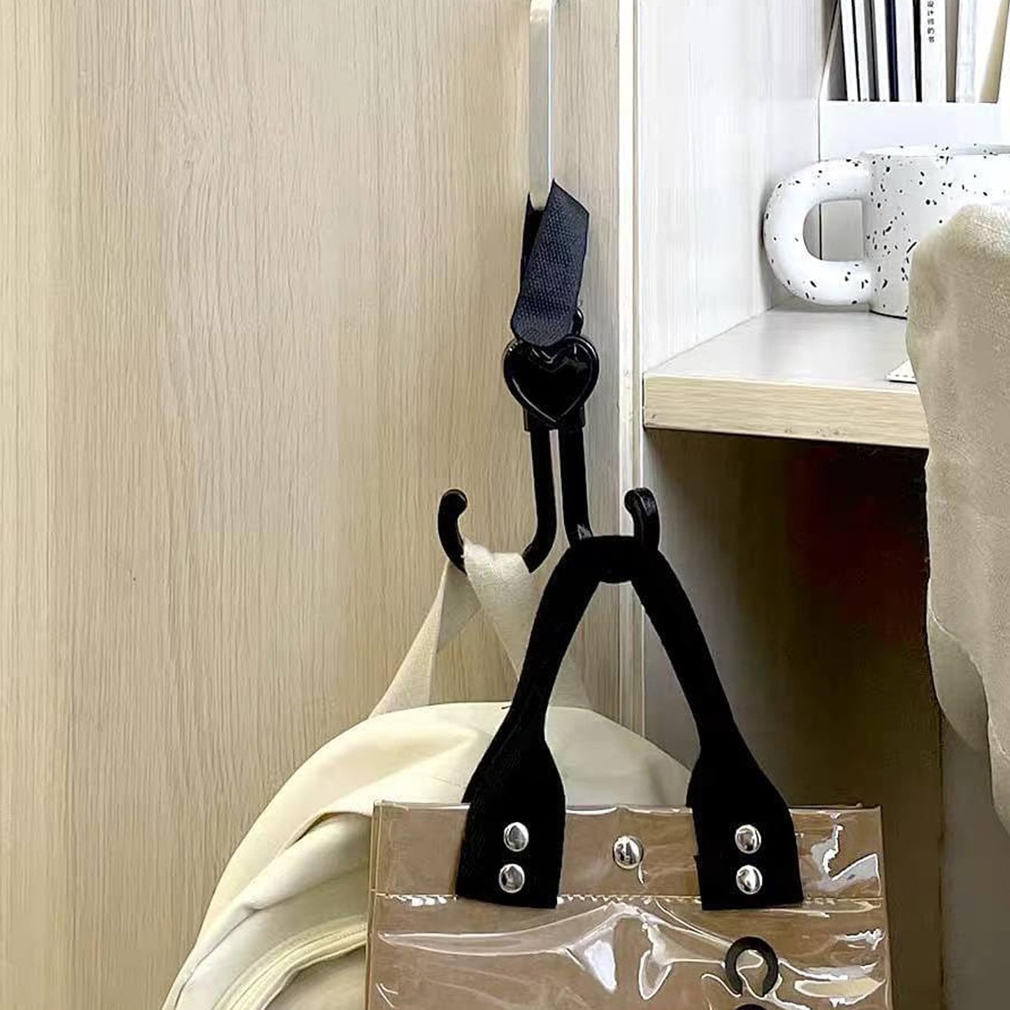 Portable baby stroller hook clipped to bicycle handle