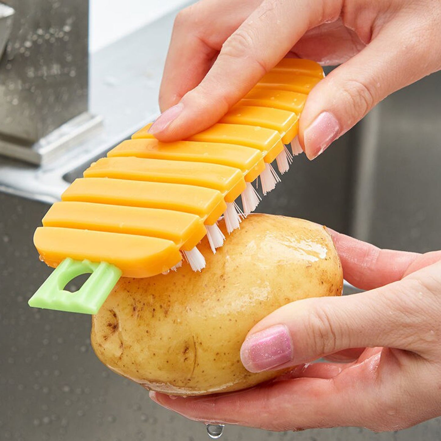 Carrot shaped vegetable scrubbing brush for potatoes and fruits