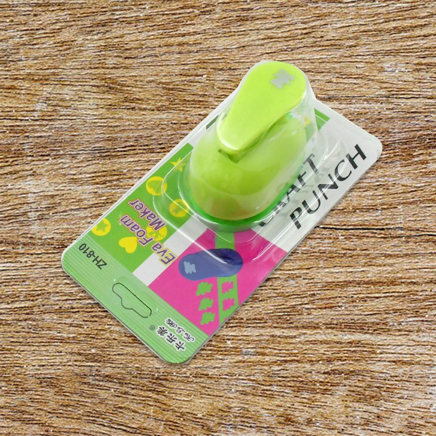Scrapbook punch tool for handmade origami and festive decorations
