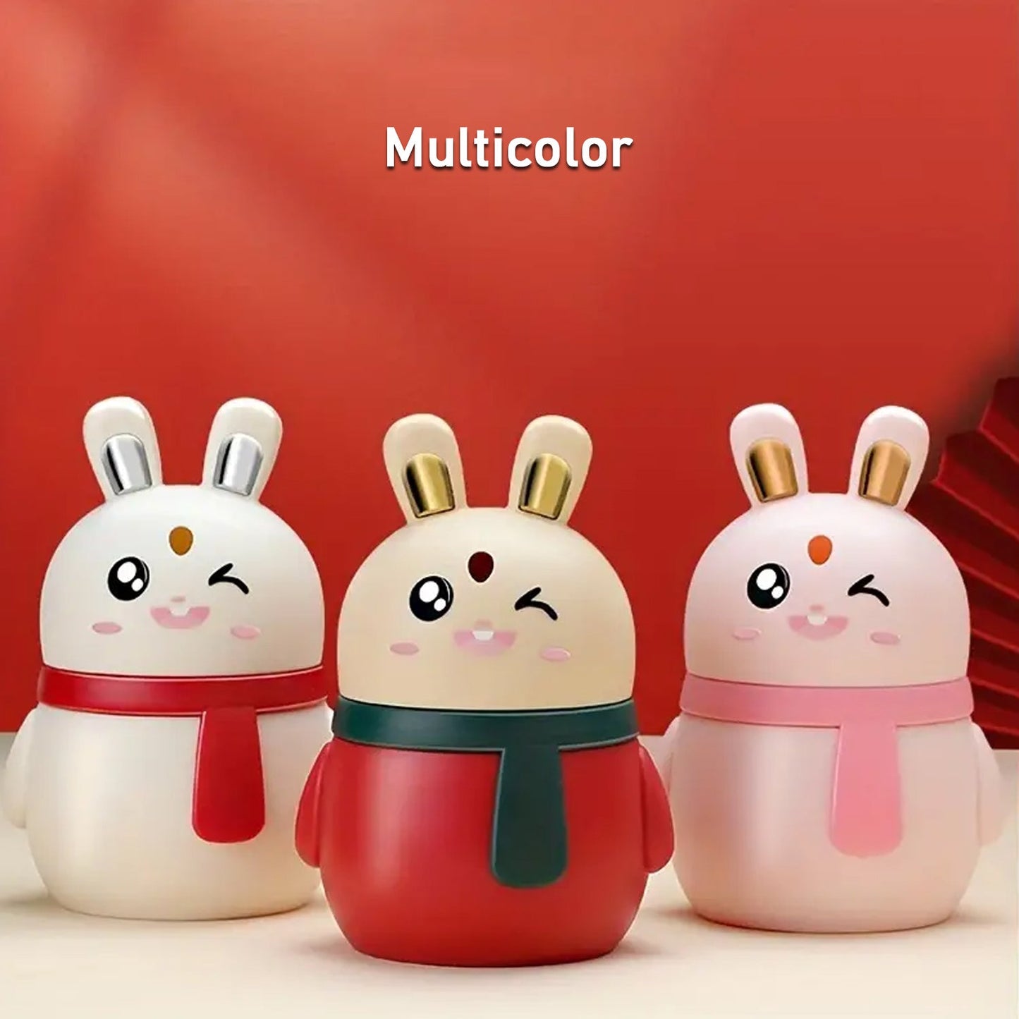 Red rabbit toothpick holder placed beside kitchen utensils