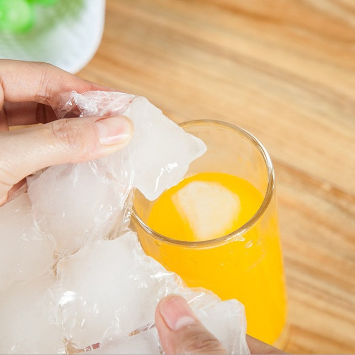 Easy release ice cube bags filled and ready in transparent freezer