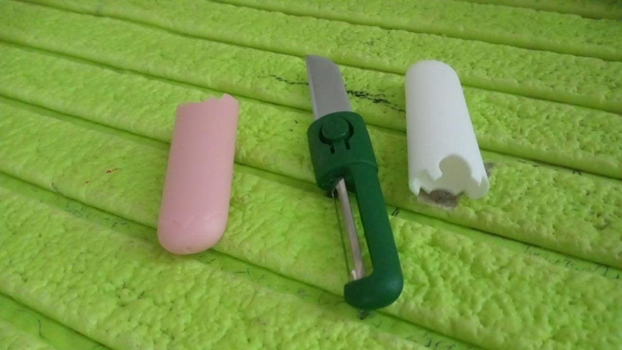 Travel-friendly fruit peeler and knife with two-way folding design