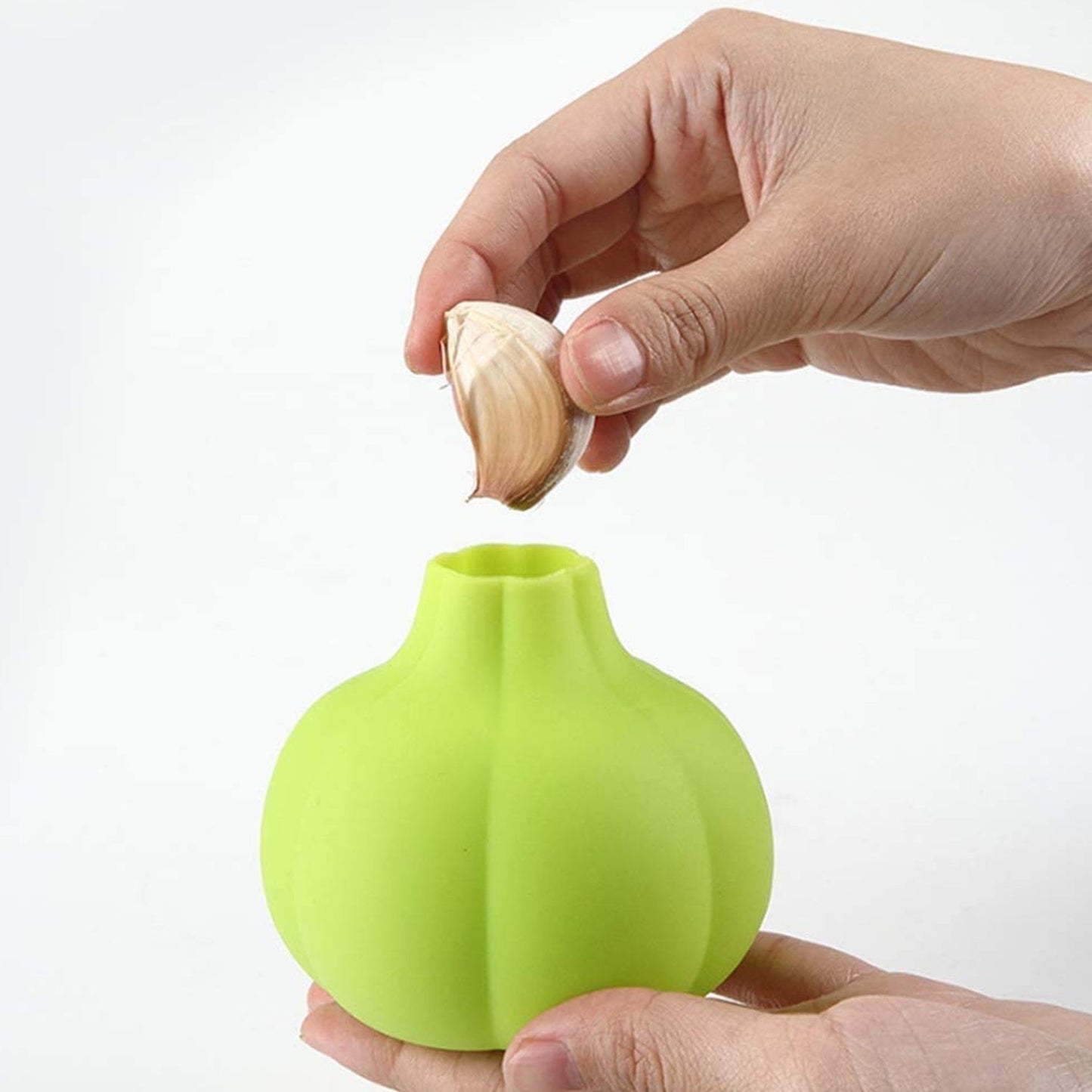 Manual silicone garlic peeler designed for cloves and ginger, durable and reusable kitchen gadget