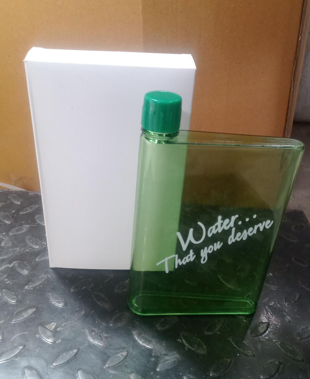 Slim transparent flat water bottle for daily use