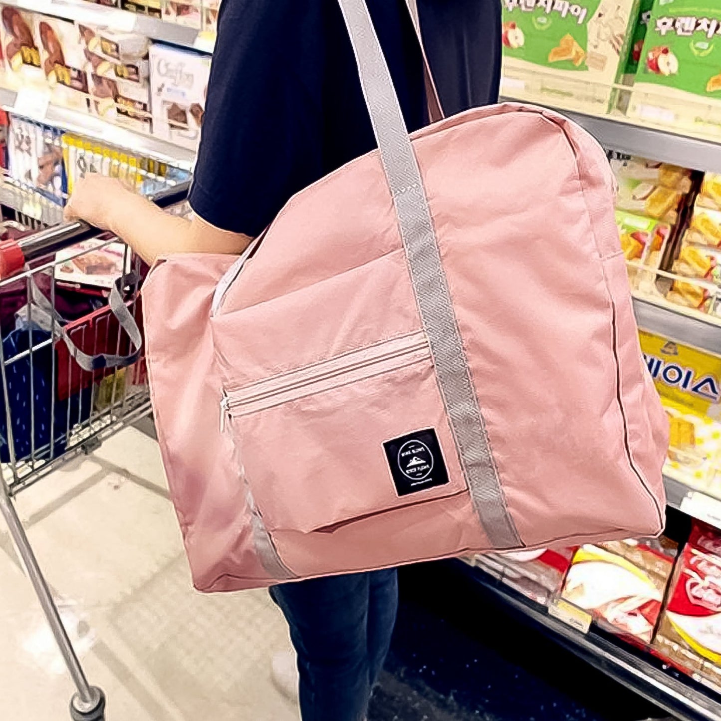 Foldable luggage storage bag with waterproof fabric