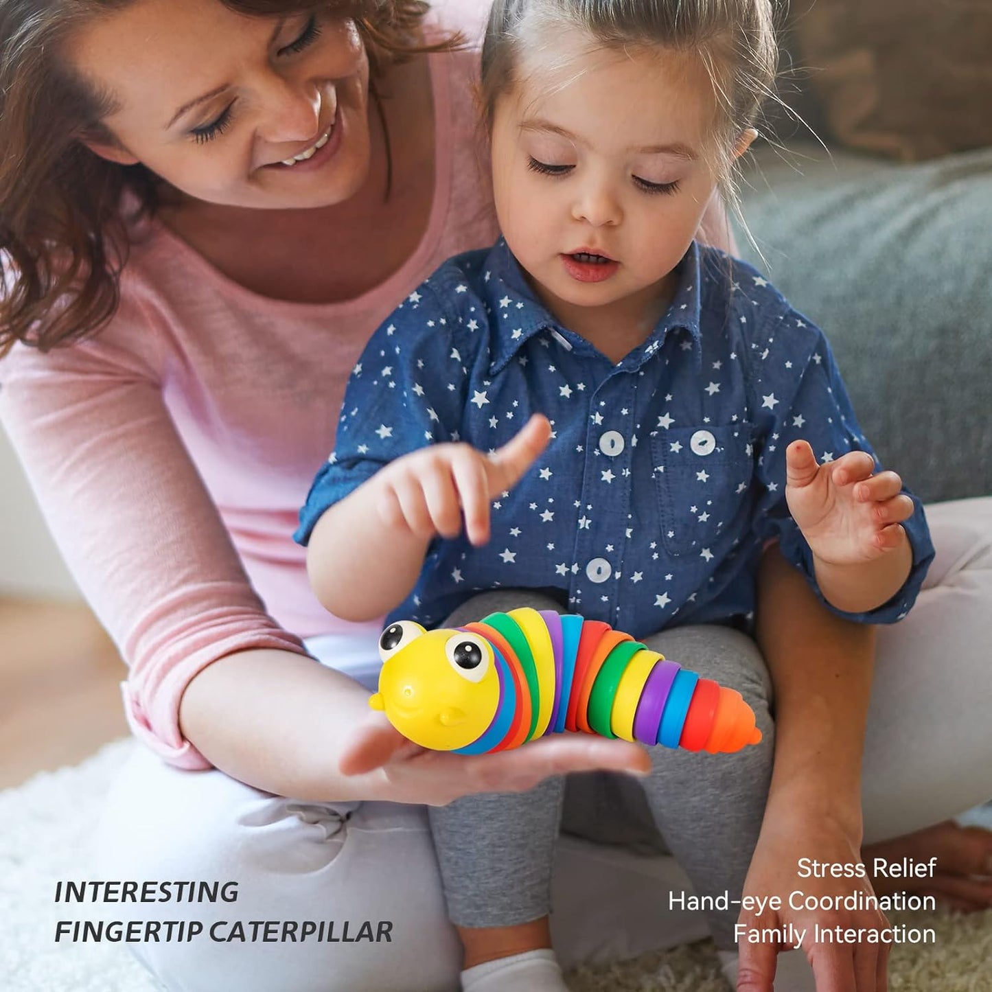 Flexible rainbow slug toy being twisted in hand