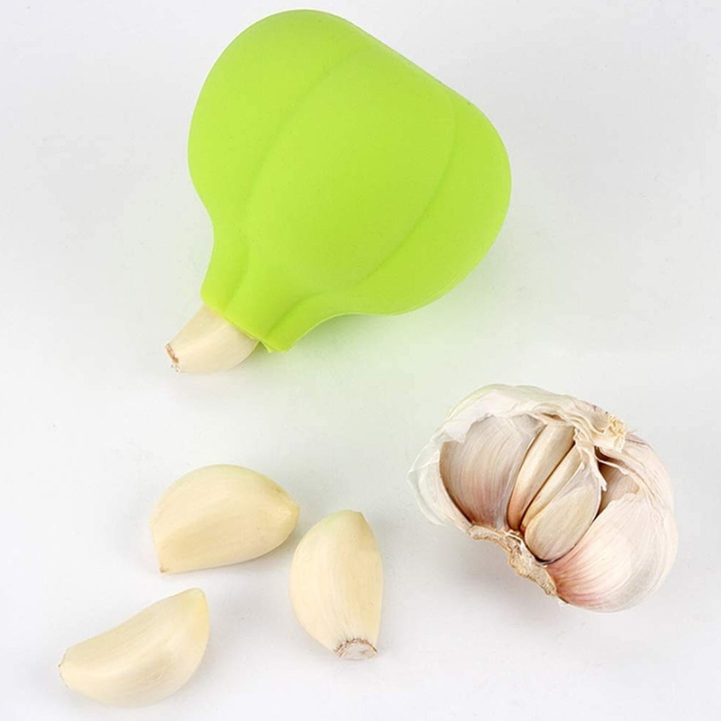 Silicone garlic remover gadget keeps hands odor free while cooking Indian spicy curries