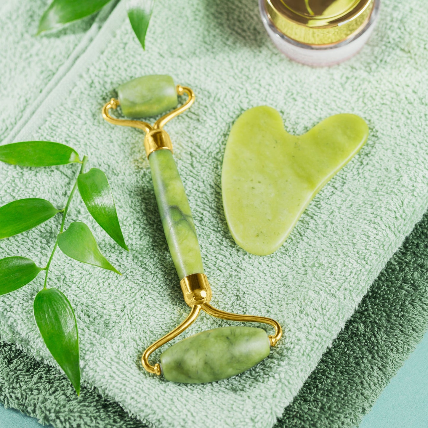 Facial massage set with smooth jade roller and multi-use gua sha stone