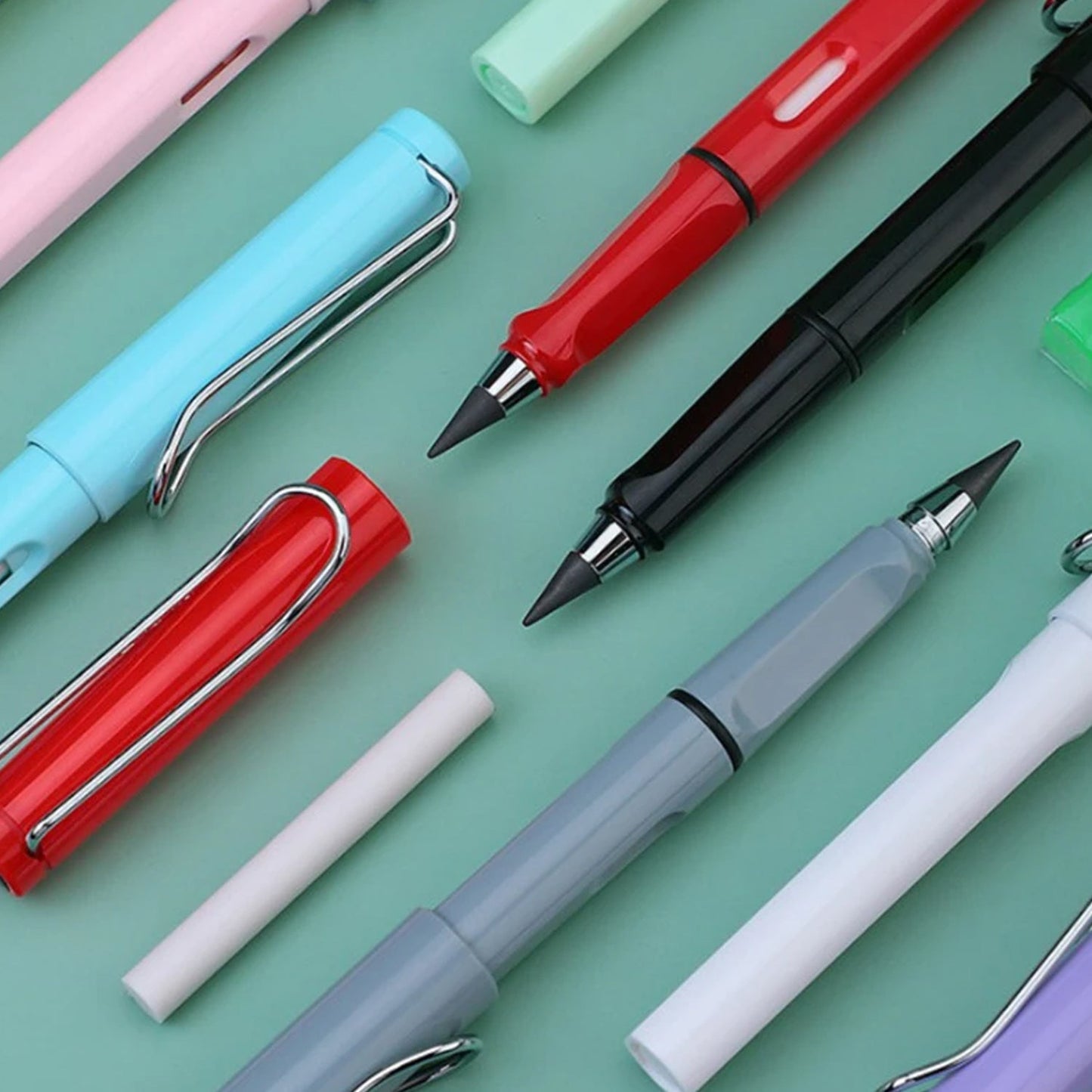 Inkless pencil closeup with replaceable alloy tip and eraser