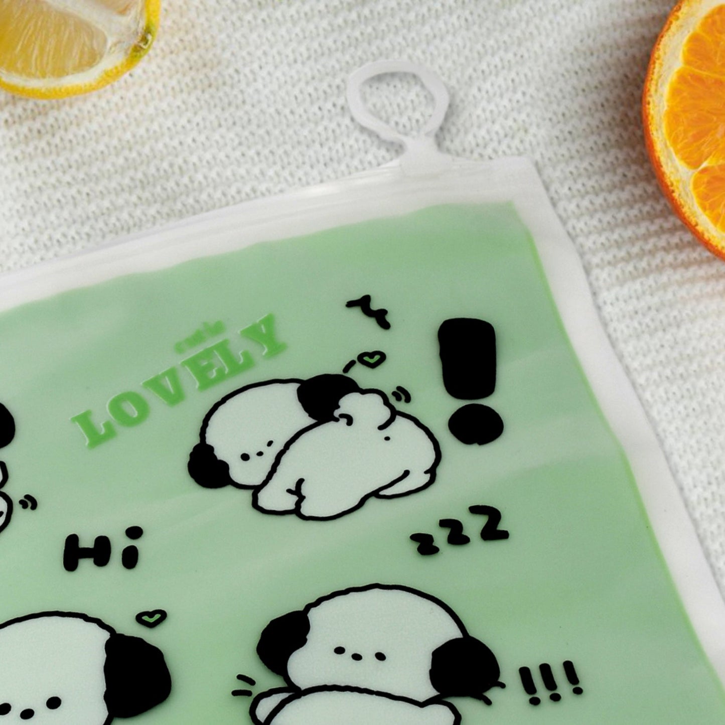 Plastic zipper pouch storing pens, markers, and accessories