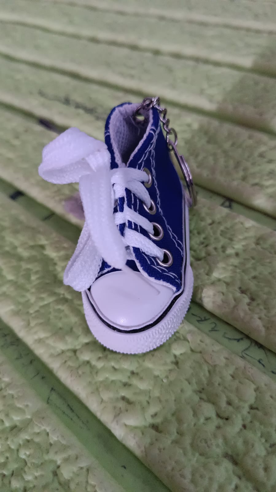 Portable mini shoe keychain for backpacks and keys