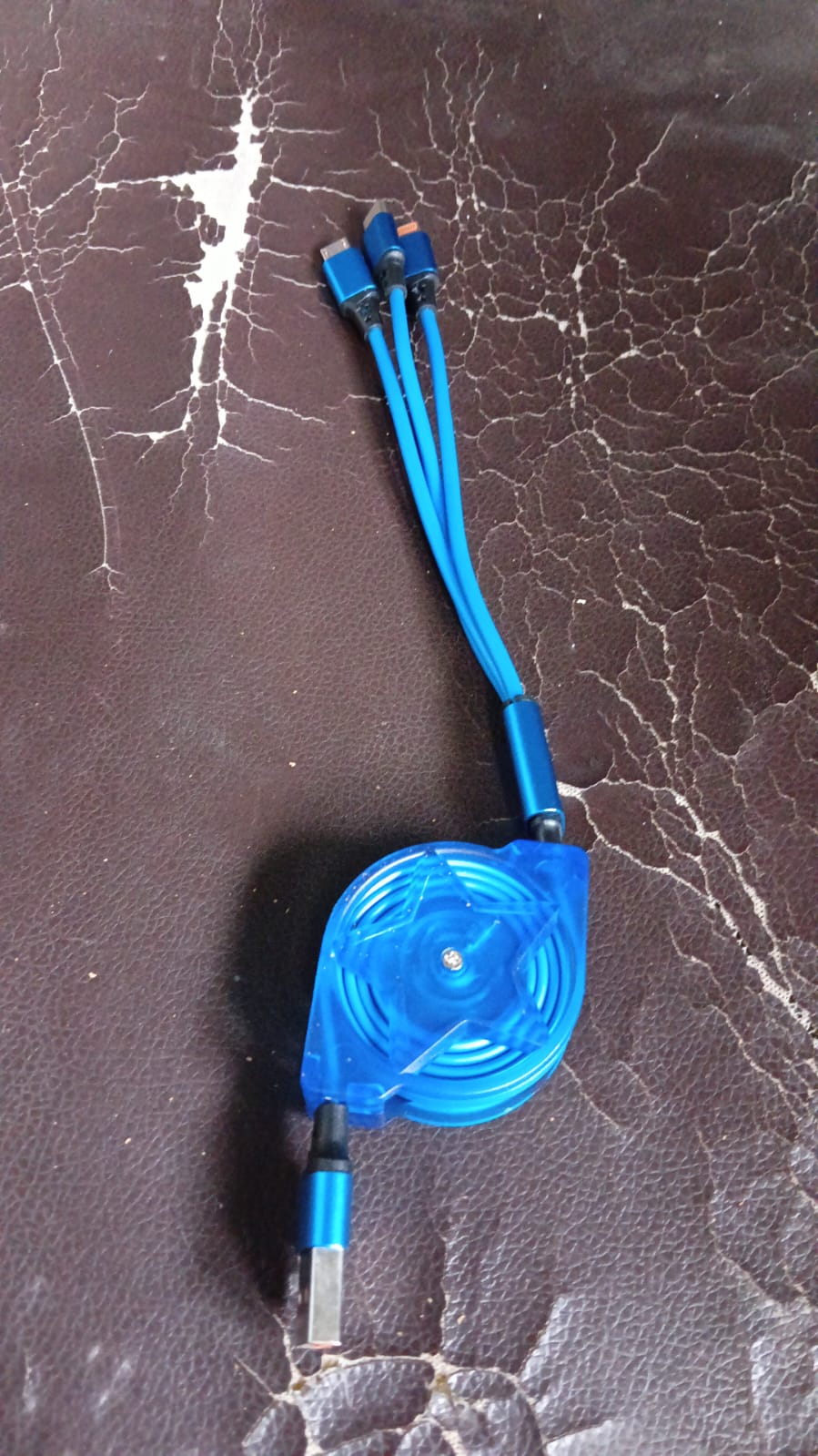 Smooth retractable cable for charging phones, tablets, and more