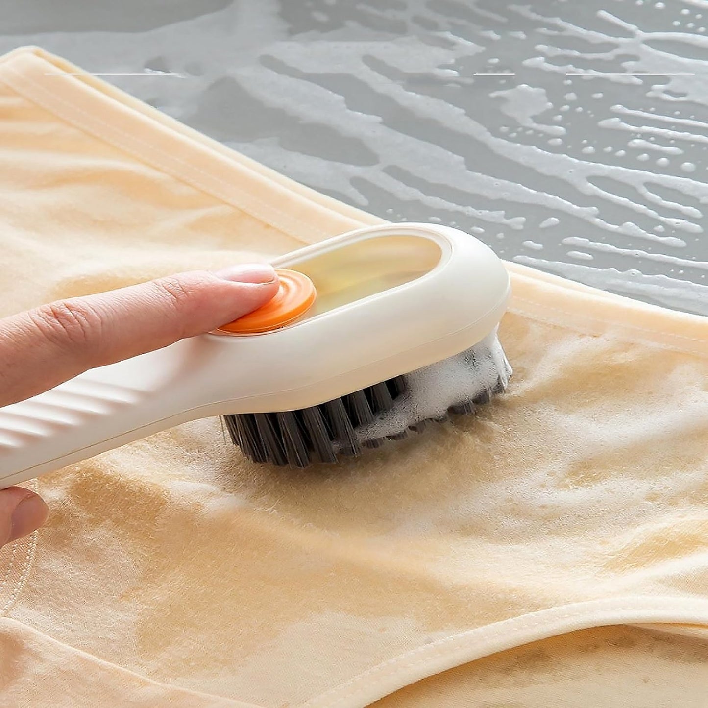 Shoe scrubbing brush with detergent dispenser and bristles