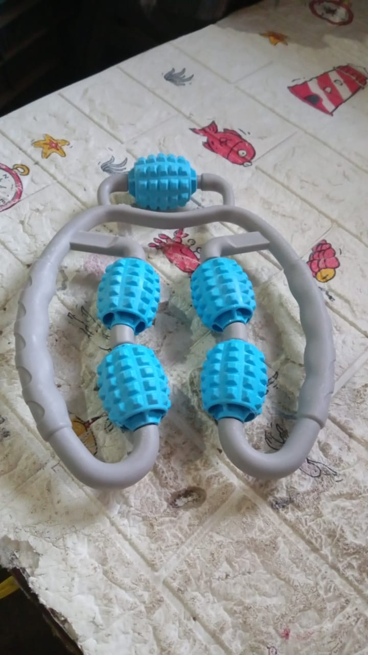 Close-up of drop-shaped massage points on elastic roller