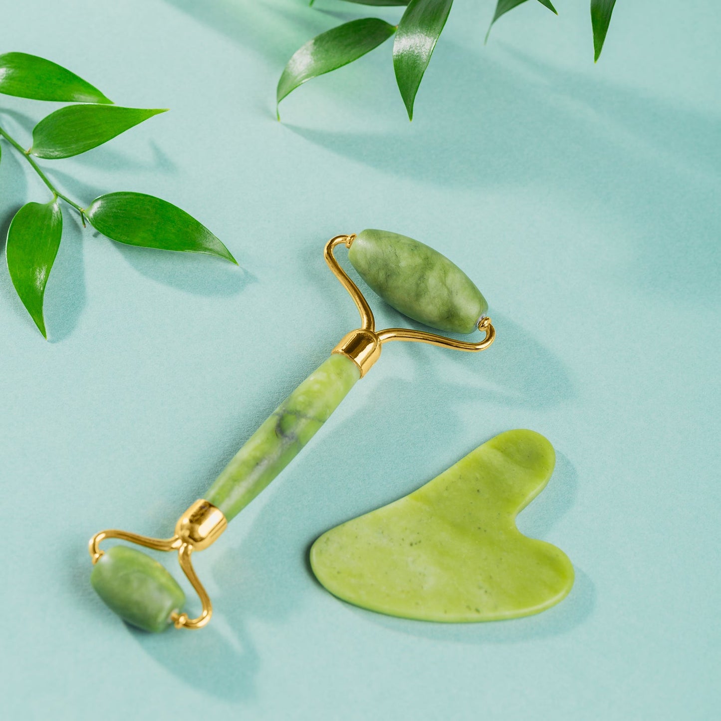 Cooling jade roller and gua sha stones for relaxing facial massage and puffiness relief