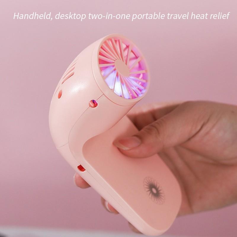 Compact table fan with portable phone holder, travel friendly