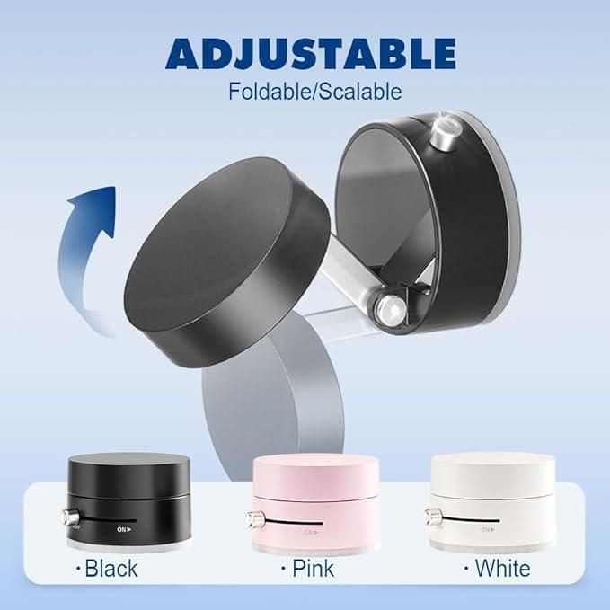 Adjustable foldable/scalable product with black, pink, and white color options on a light blue background. Foldable retractable phone holder demonstrating magnetic attachment system and vacuum suction mounting technology