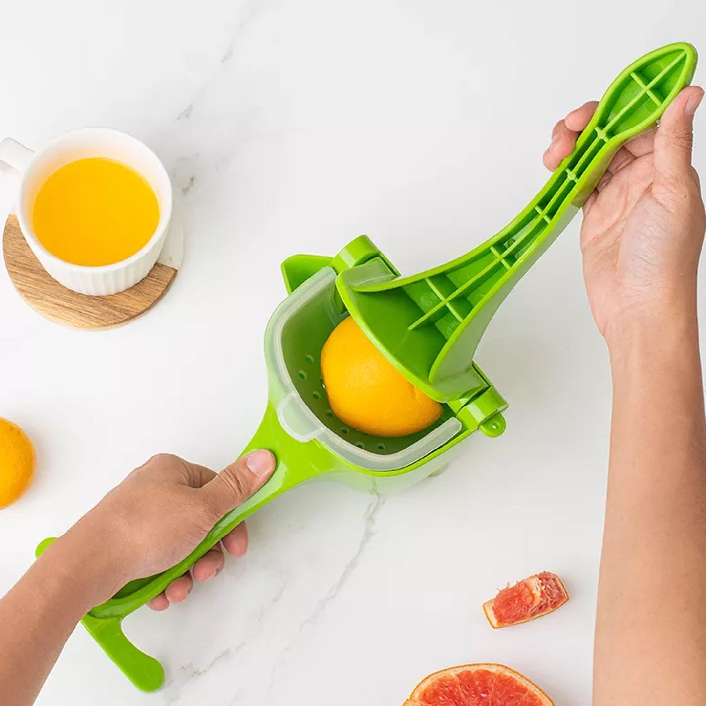 BPA-free manual fruit squeezer with durable plastic construction