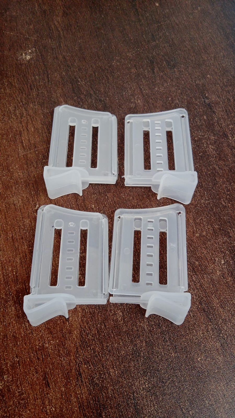 Snap type refrigerator clips installed in fridge drawer storage