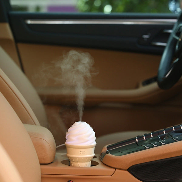 Small portable humidifier connected to laptop USB for fresh air