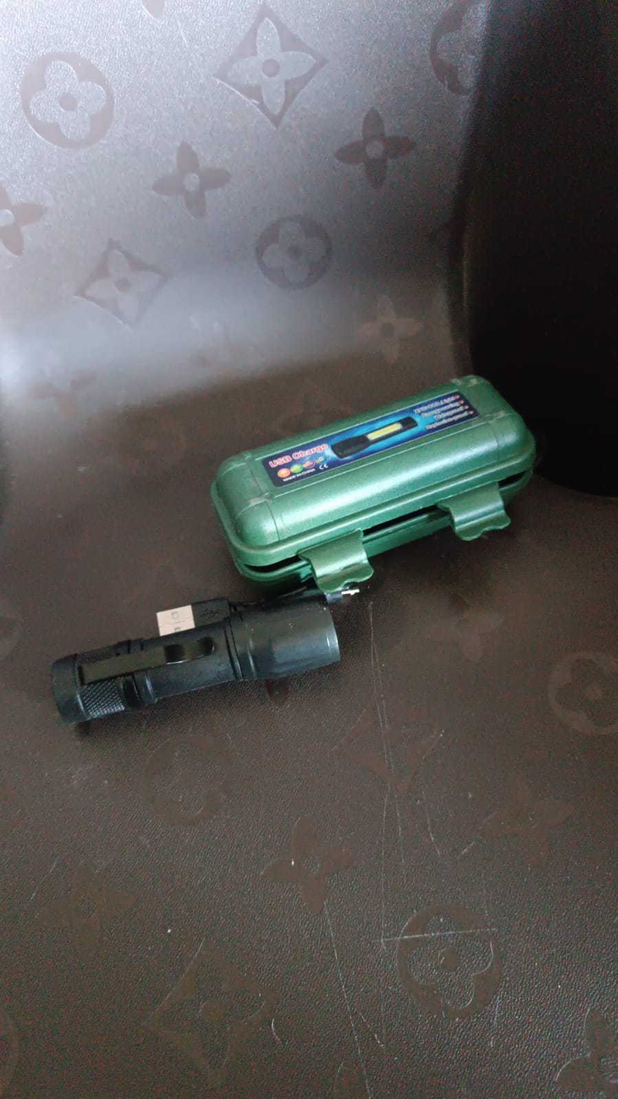 LED torch with zoomable head and side light feature, designed for outdoor and indoor use