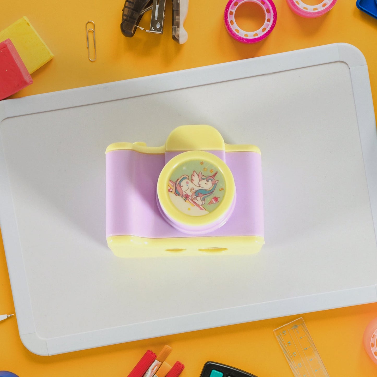 Lightweight camera style pencil sharpener for students