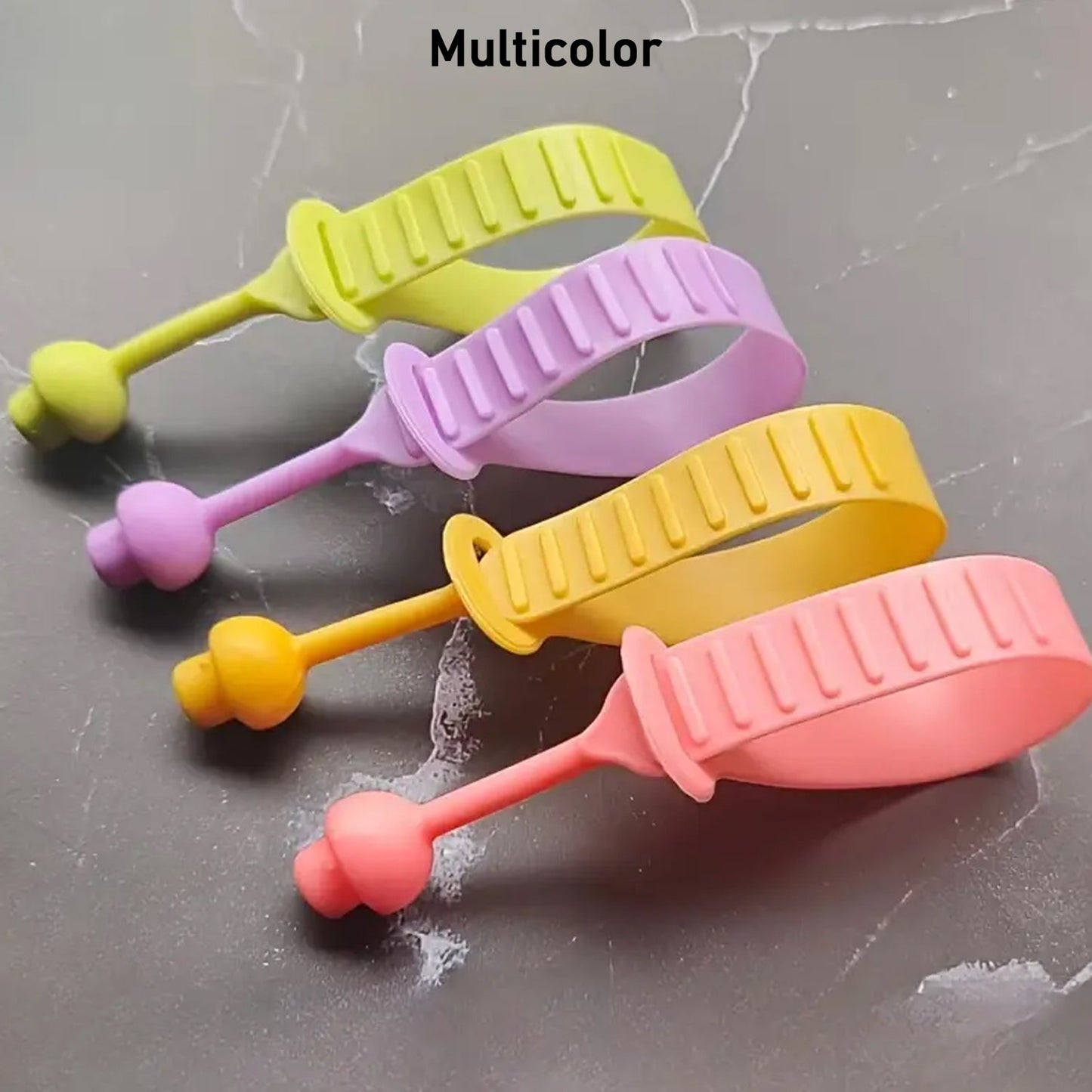 Self adhesive yet reusable silicone toilet seat lifter grip