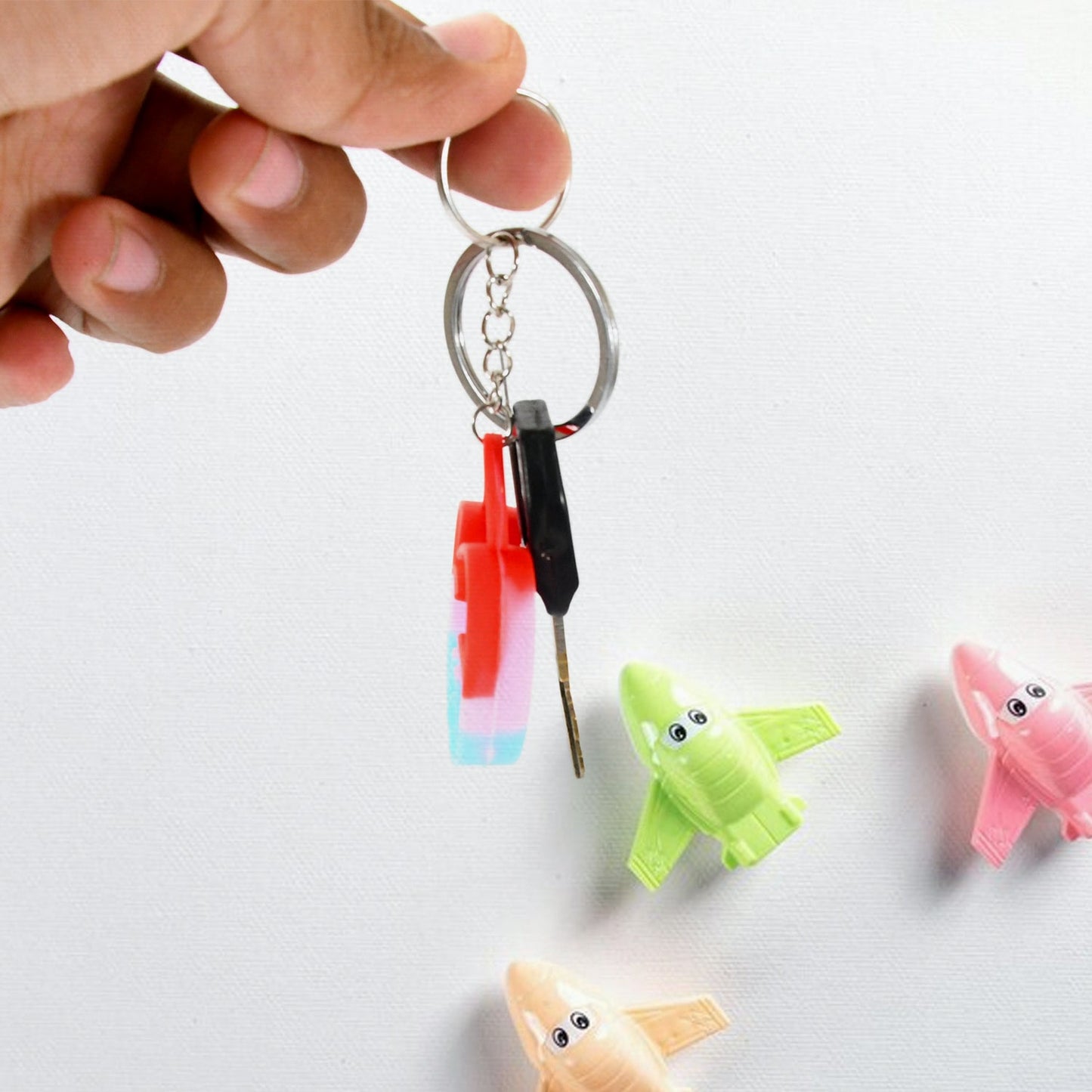 Durable silicone bubble ping toy attached to keys