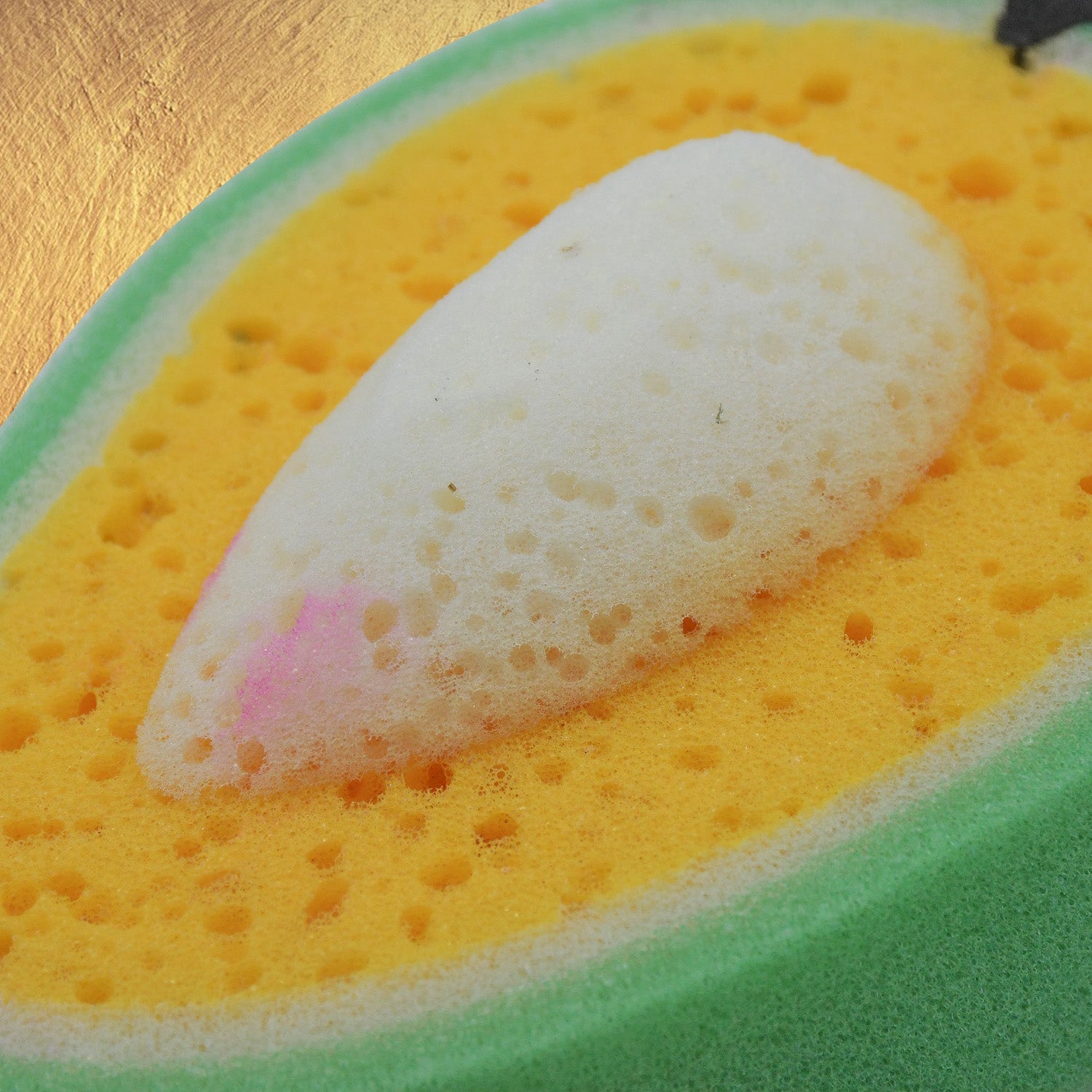 Bright yellow washing pad for bowls, pots, and pans