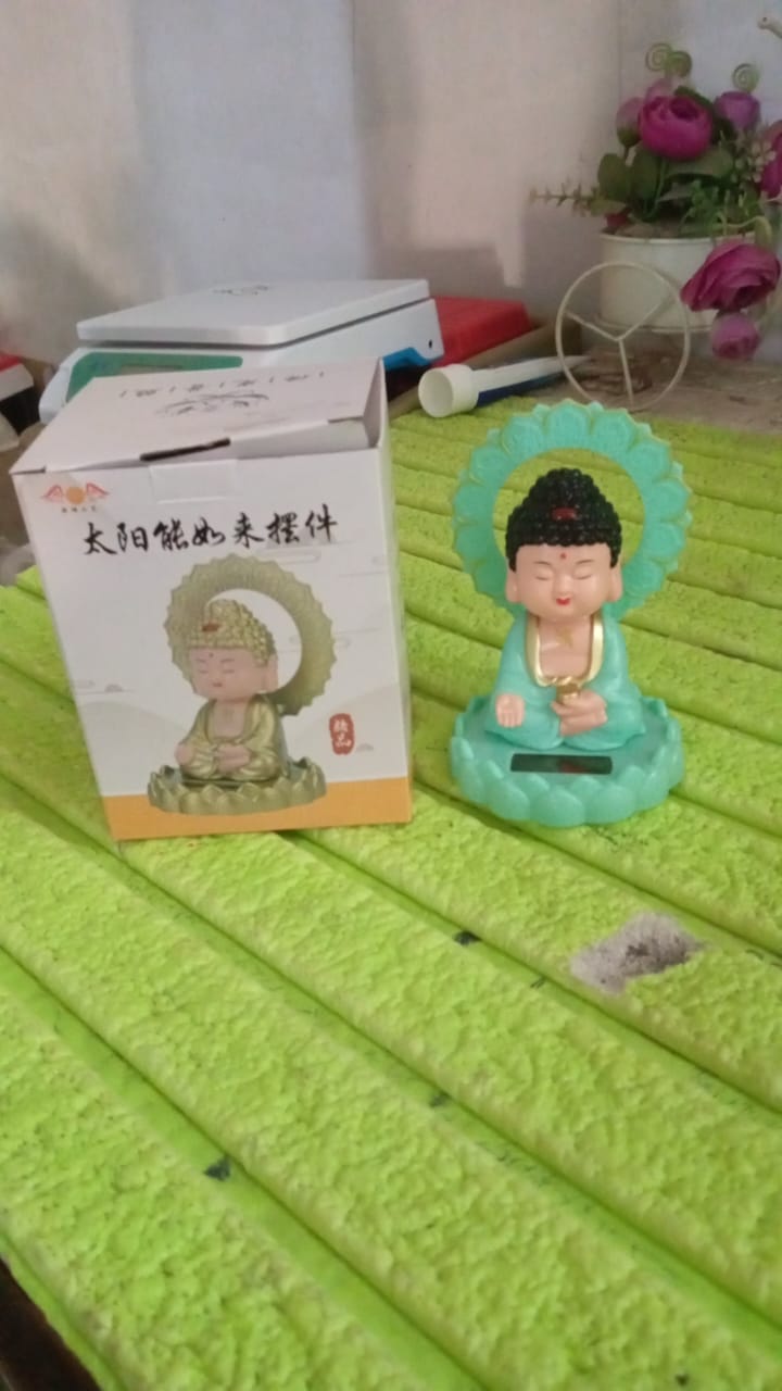 Wealth and prosperity Buddha statue solar powered nodding design